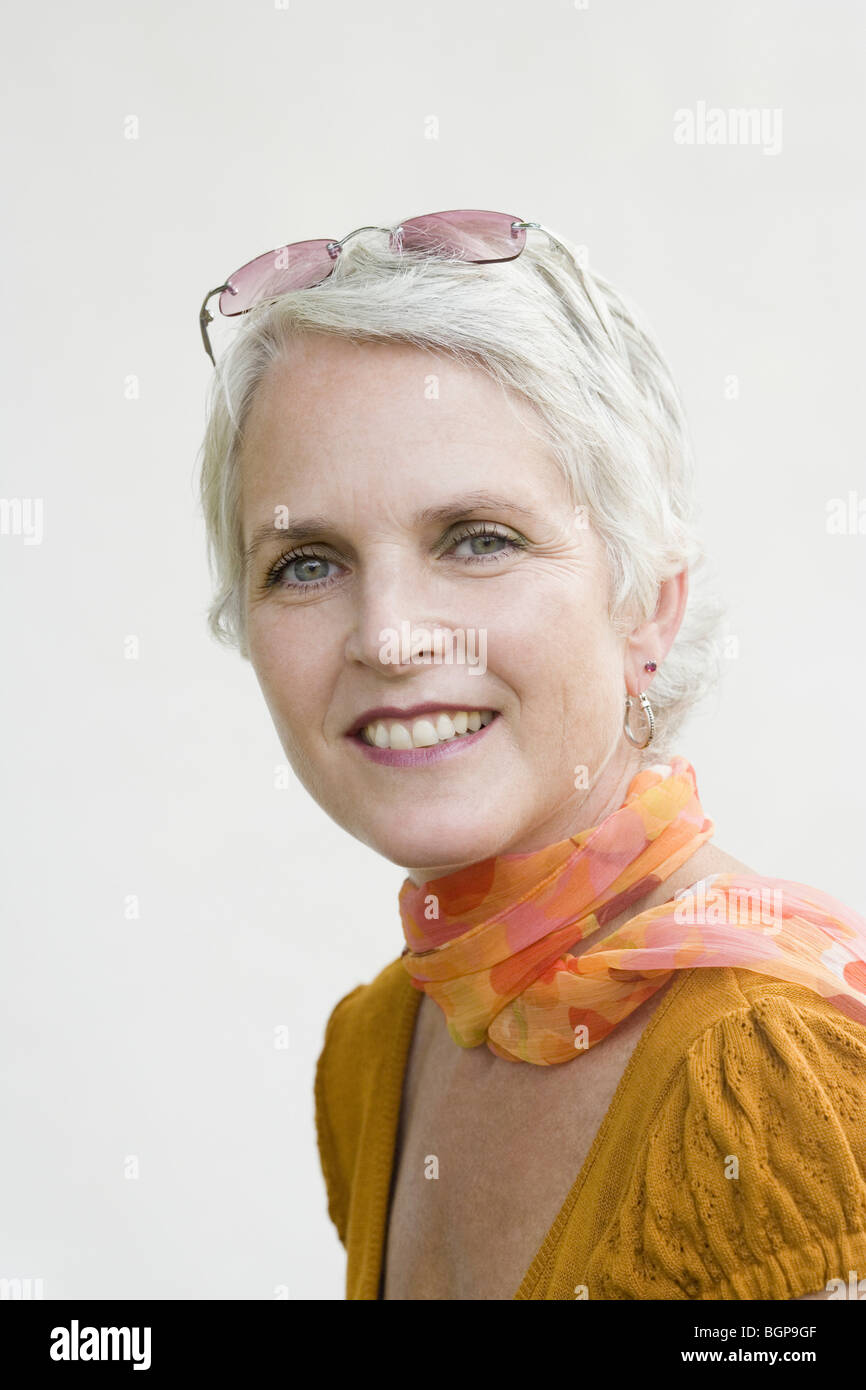 Portrait of a mature woman smiling Stock Photo - Alamy
