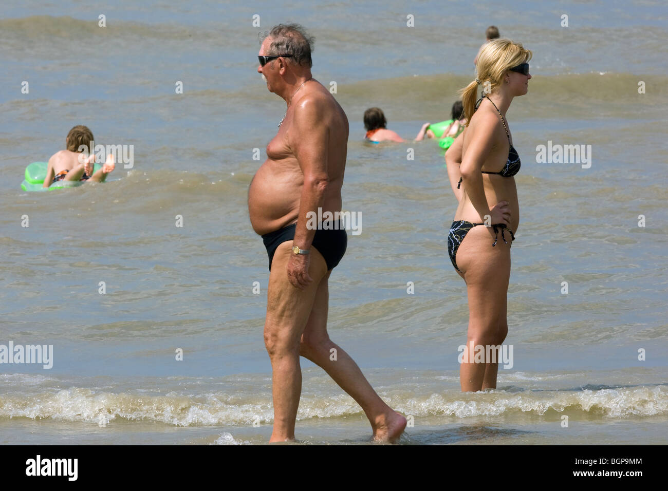 Fat man in swimming trunks hi-res stock photography and images - Alamy