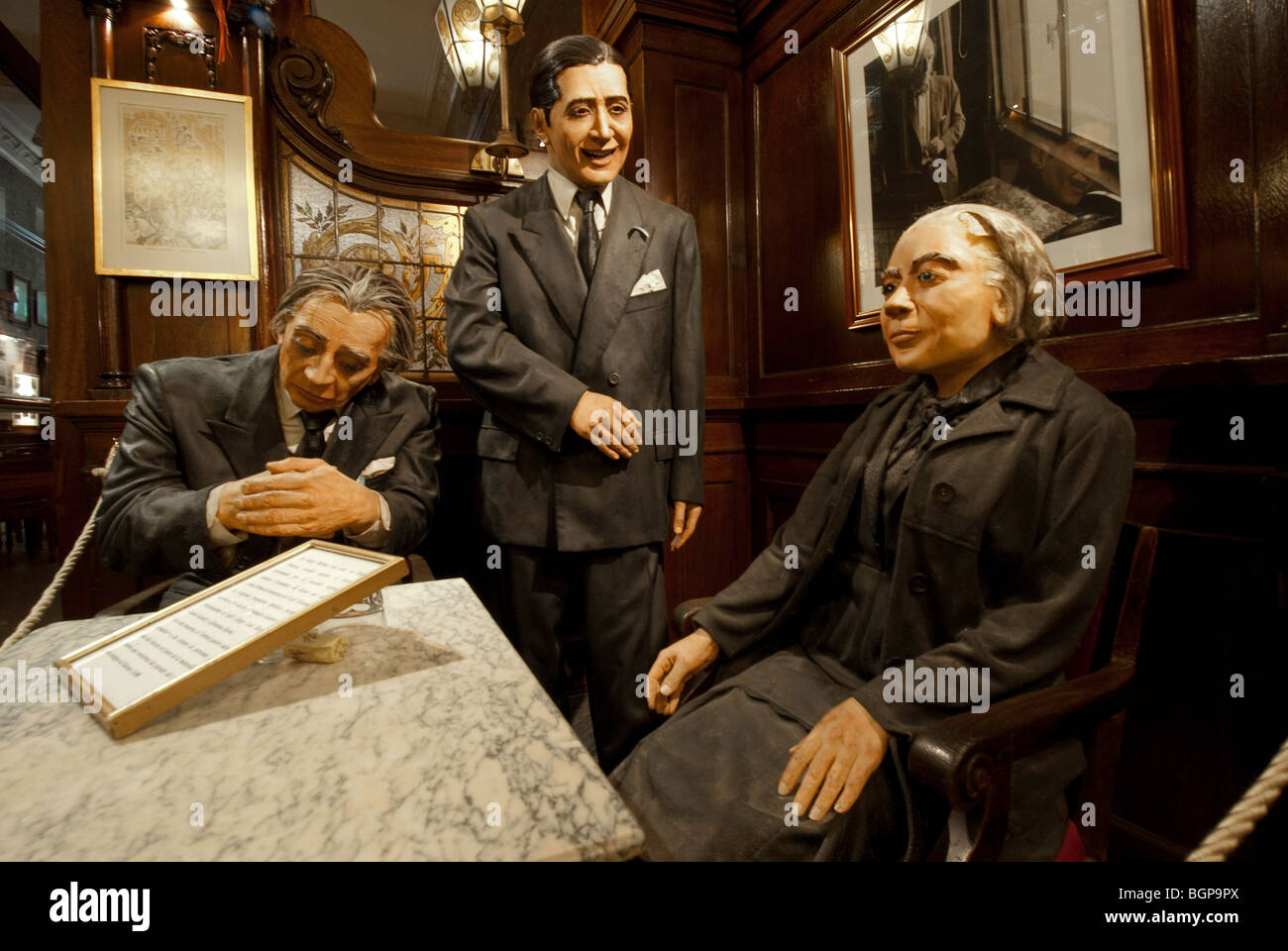 Sculpture models of famous clients in Cafe Tortoni, Buenos Aires, Argentina Stock Photo