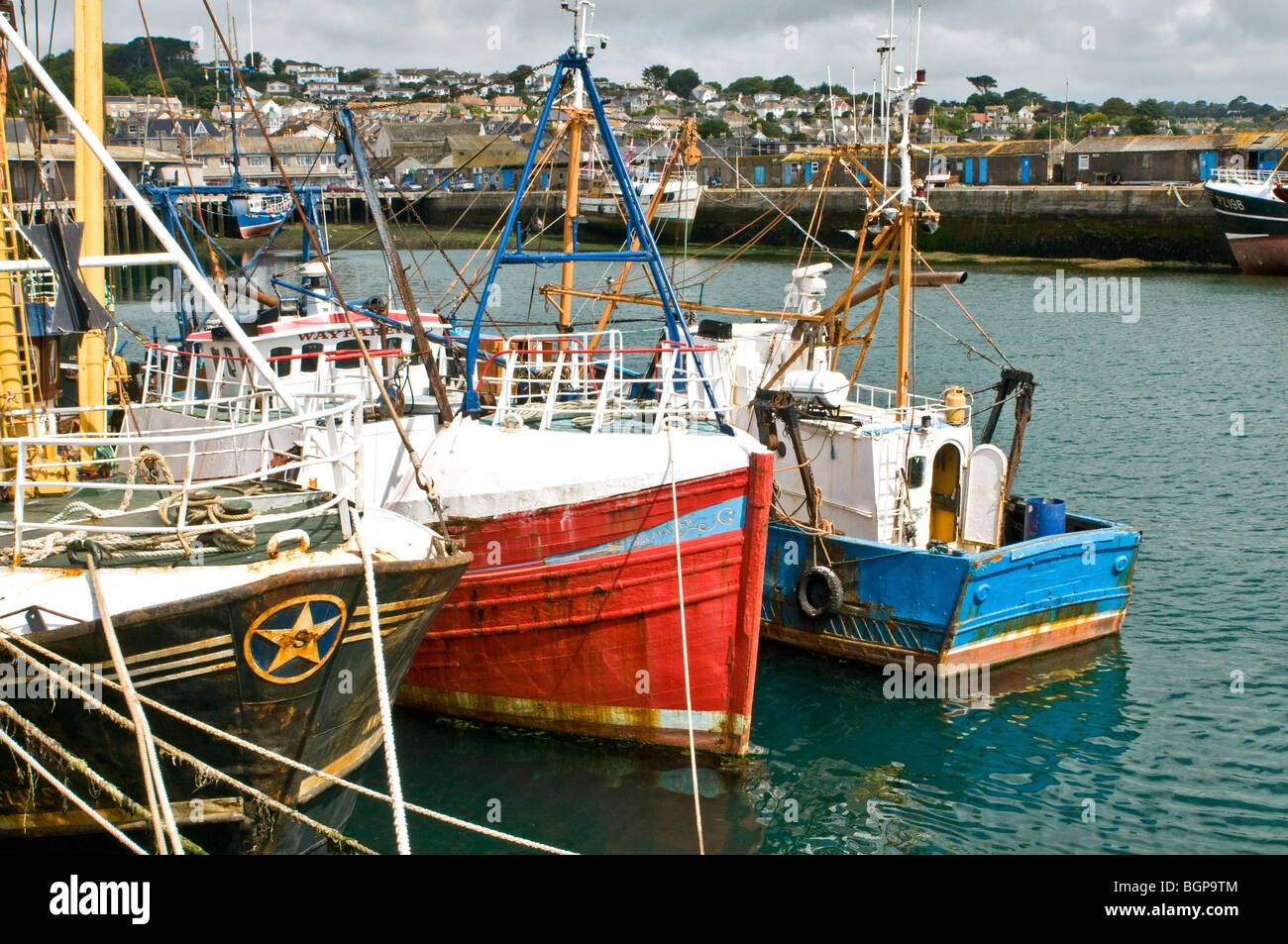 Newlyn Harbour near Penzance, Cornwall, with trawlers moored up Stock Photo