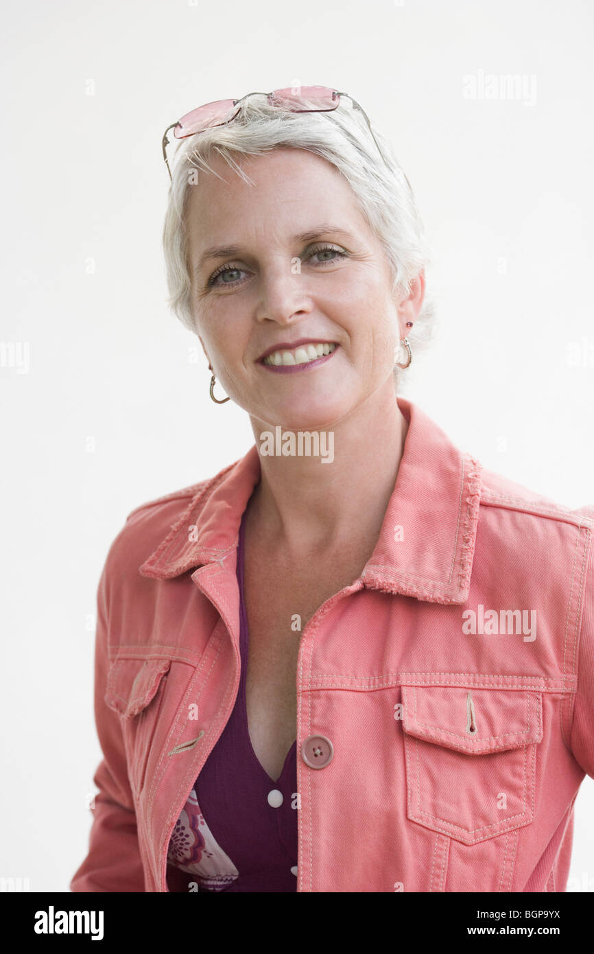 Portrait of a mature woman smiling Stock Photo - Alamy