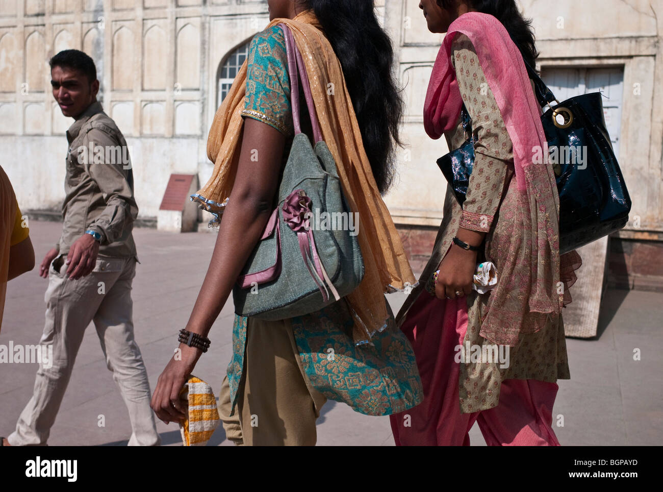Fashionable women toting handbags at the Red Fort complex in Delhi, India Stock Photo