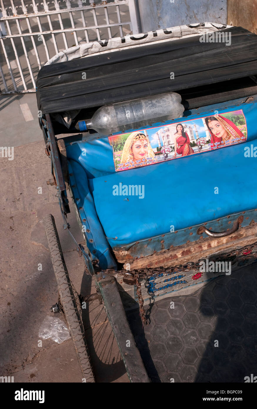 Rickshaw with Indian women stickers on a blue seat, Delhi 2009 Stock Photo