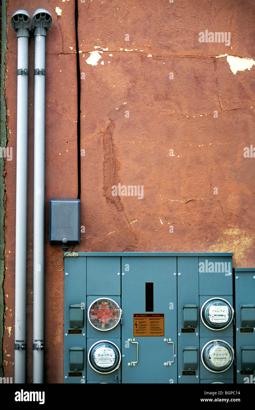 Electrical equipment in an alley. Stock Photo