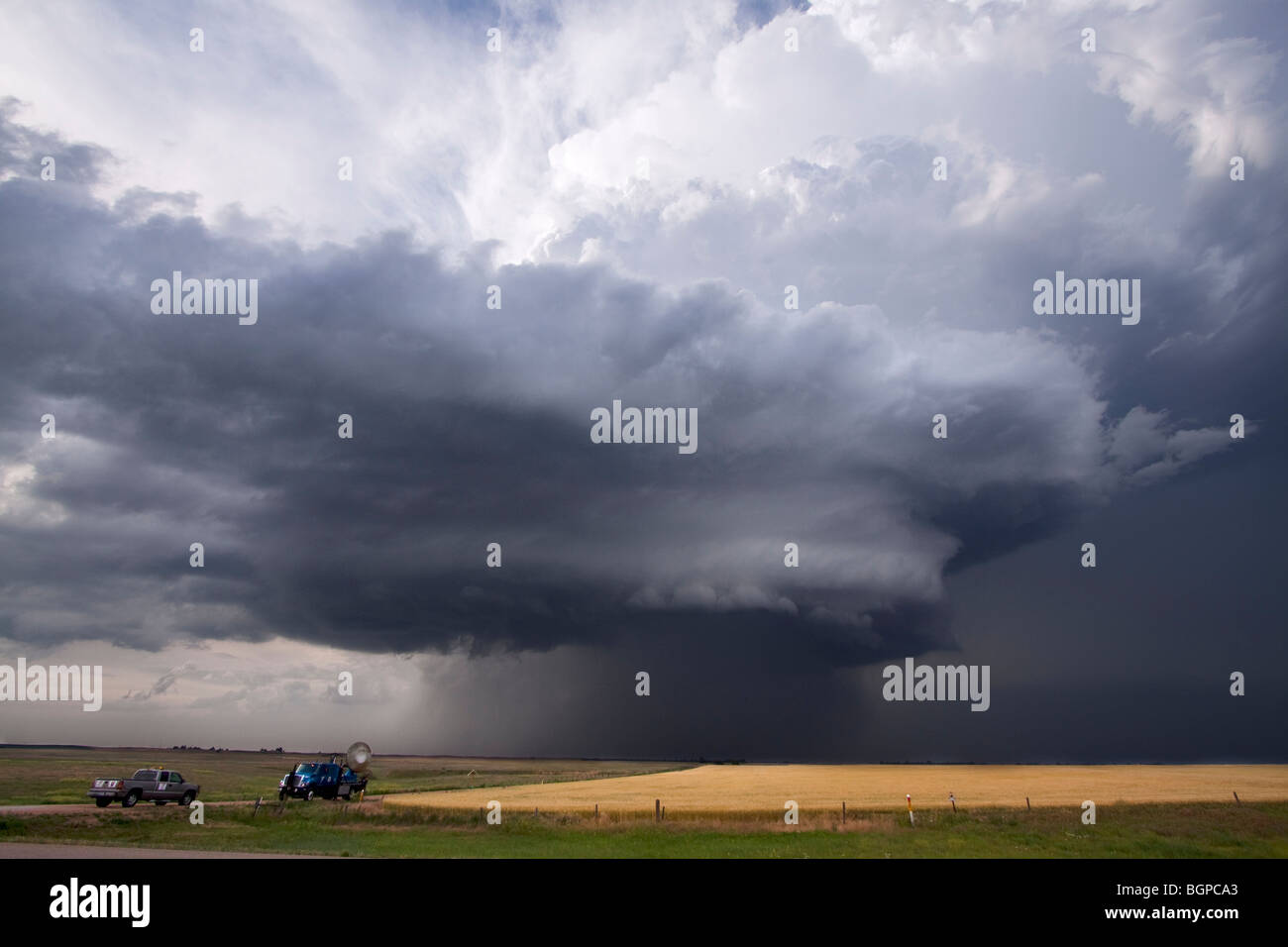 A Doppler on Wheels mobile radar truck scans a storm near Dodge City, Kansas. The DOW truck is participating in Project Vortex 2 Stock Photo
