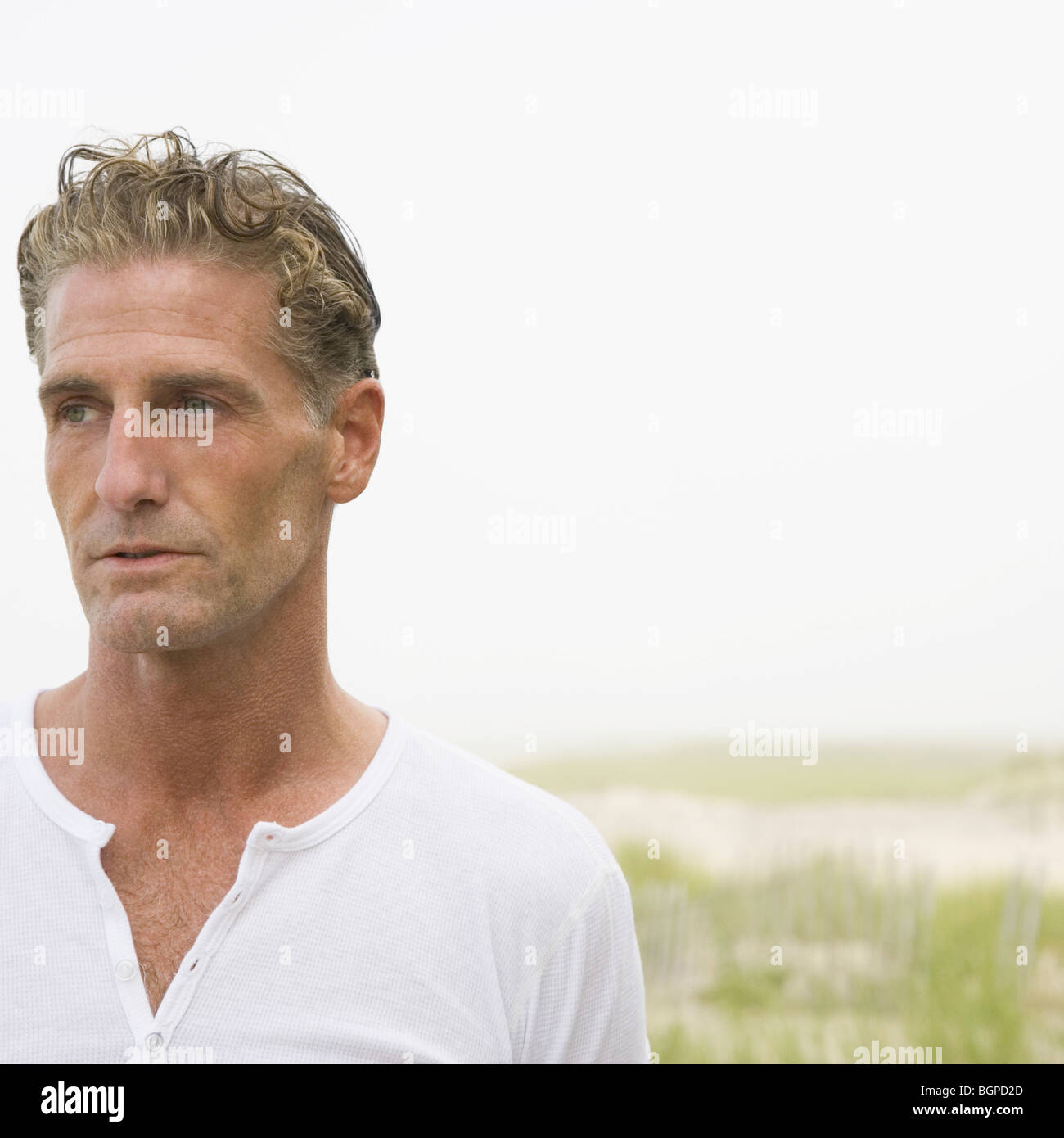 Mature man thinking beach hi-res stock photography and images - Alamy