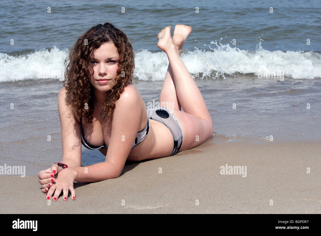Girl lying down on the beach nude Page 3 Sunbathing Teen Not Nudity High Resolution Stock Photography And Images Alamy