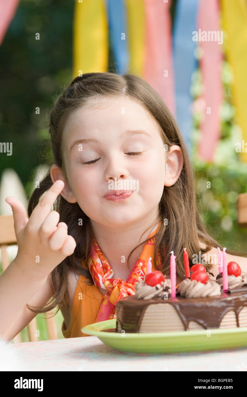 Age 9 girl and birthday cake hi-res stock photography and images - Alamy