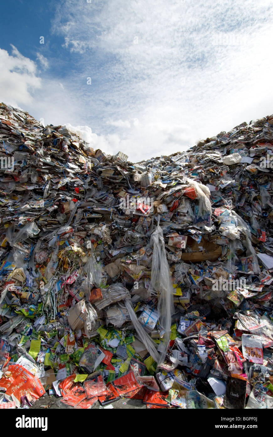 Heaps of recyclable paper, magazines, books stored at the yard of the