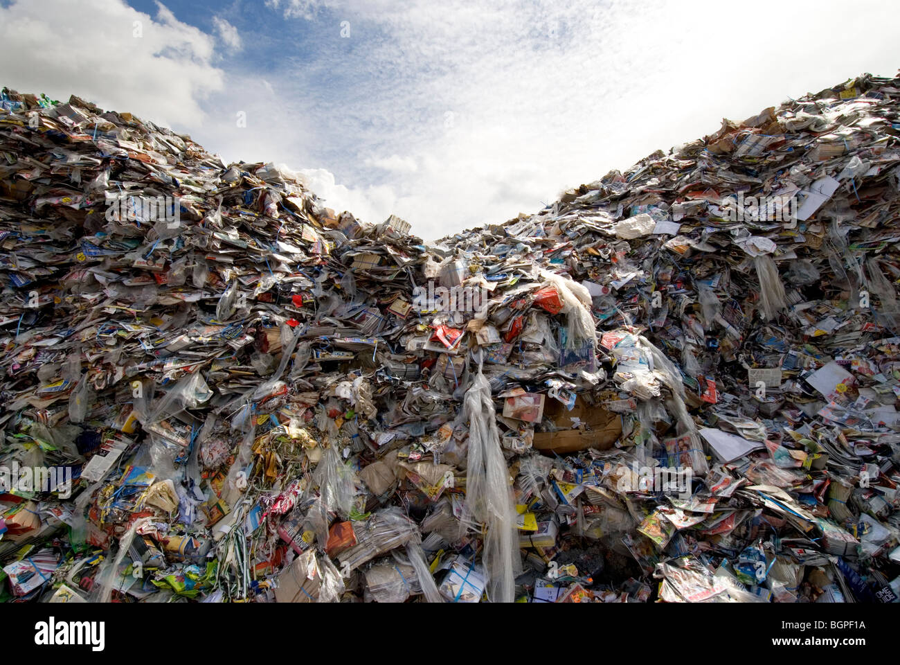 Heaps of recyclable paper, magazines, books stored at the yard of the