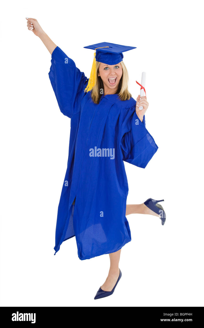 A female Caucasian with blond hair standing in blue graduation gown and smiling. She is on a white background. Stock Photo