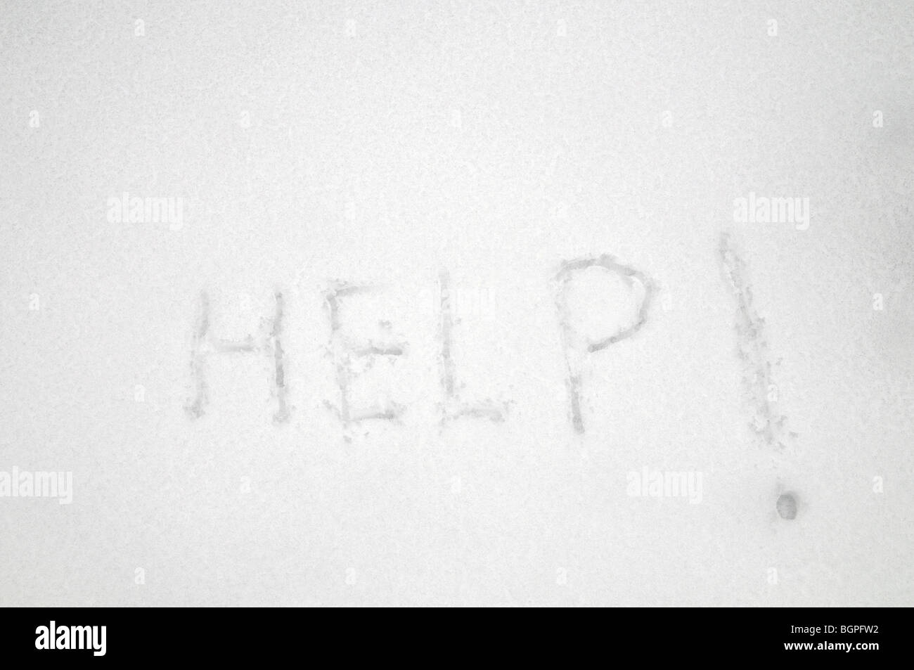 A Help Message Written In The Snow To Be Seen From Above For Rescue Stock Photo Alamy