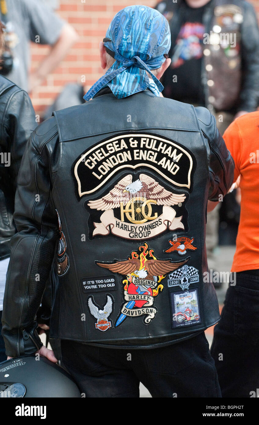 Harley Davidson Biker Wearing A Leather Jacket With Emblem Emblazoned On The Back Stock Photo Alamy