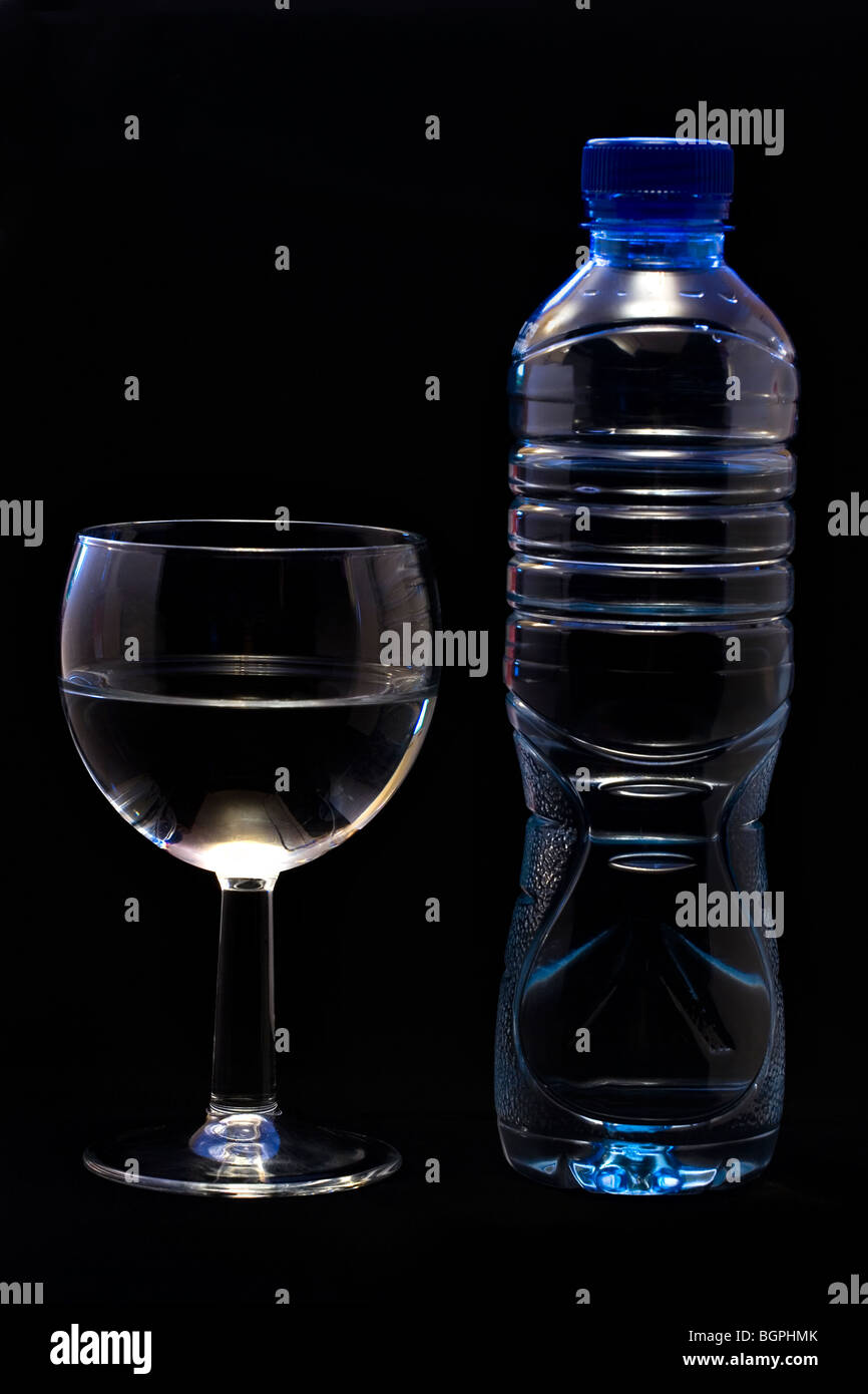 Bottled mineral water and glass Stock Photo Alamy