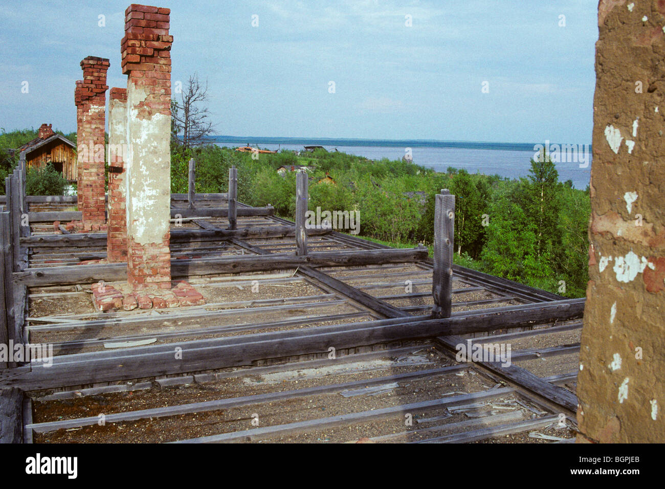 Ground level view of the deserted Stalin era gulag buildings from the Salekhard Igarka Railway in northern Siberia. Stock Photo
