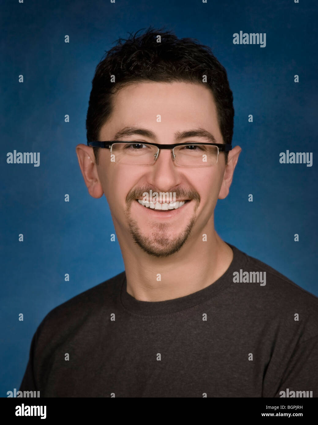 Portrait of young man in glasses Stock Photo - Alamy