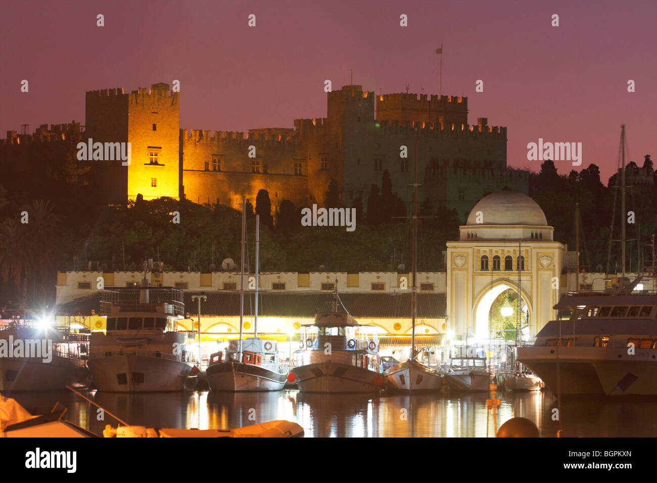 Rhodes Harbour at dusk, Greece Stock Photo