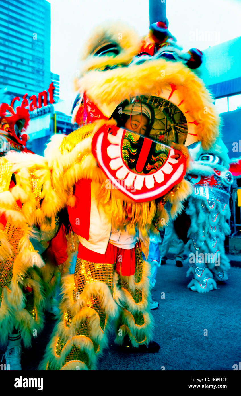 Boys playing dragon dance hi-res stock photography and images - Alamy