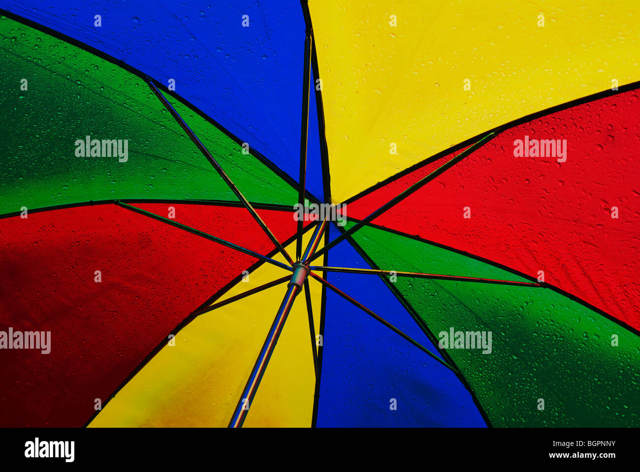 Colourful umbrella with rain drops Stock Photo Alamy