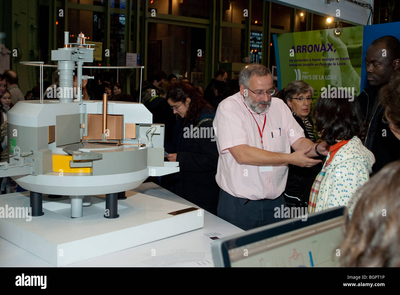Paris, France, French Scientists, Talking Sharing Cyclotron Model at 'Fete de la Science', French National 'Science Fair', scientist presentation, experts Stock Photo