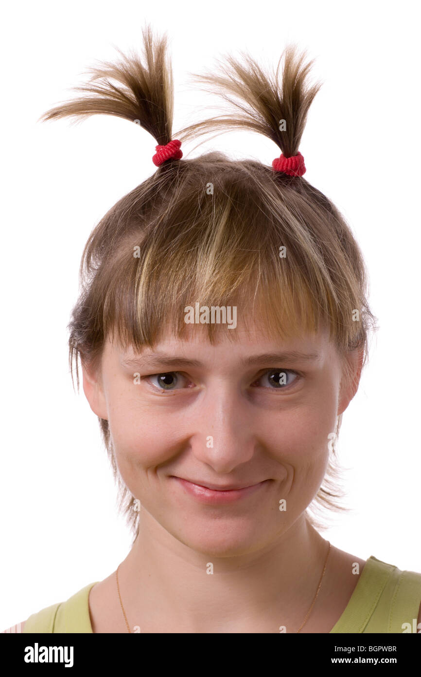 funny young woman with crazy horns of hair isolated on white Stock Photo