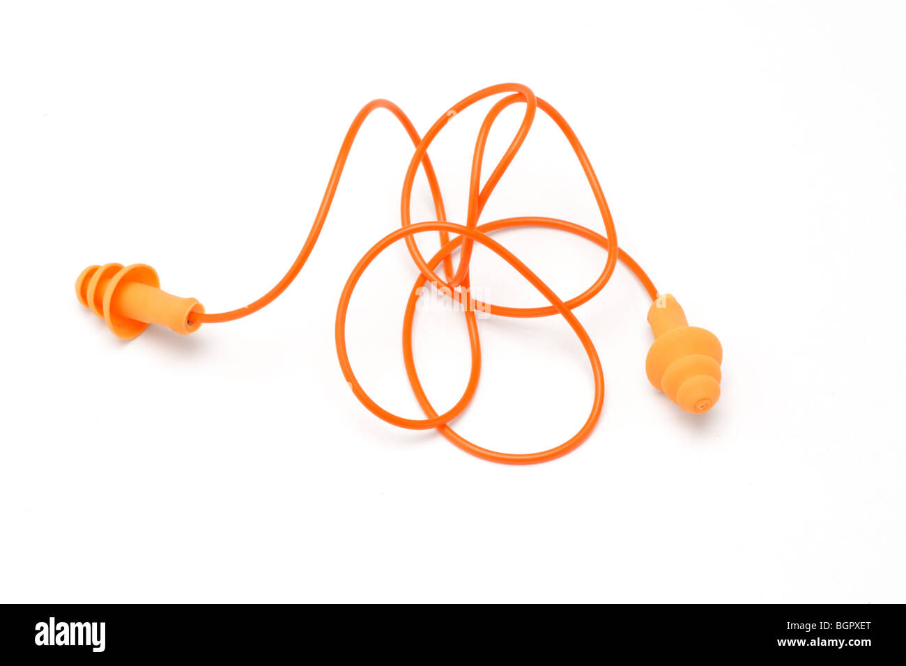Orange color ear plugs on white background Stock Photo