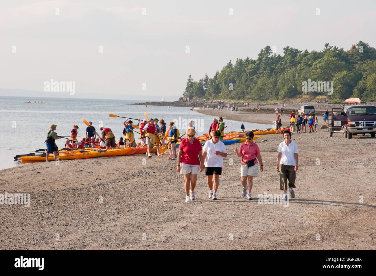 Kayakers prepare to take an outing from the bar at Bar Harbor, Mount Desert Island, Maine Stock Photo