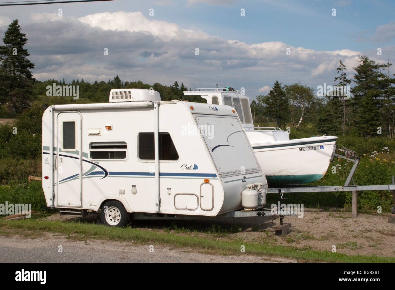 Mini Travel Trailer and a boat on a trailer in South Addison, Maine