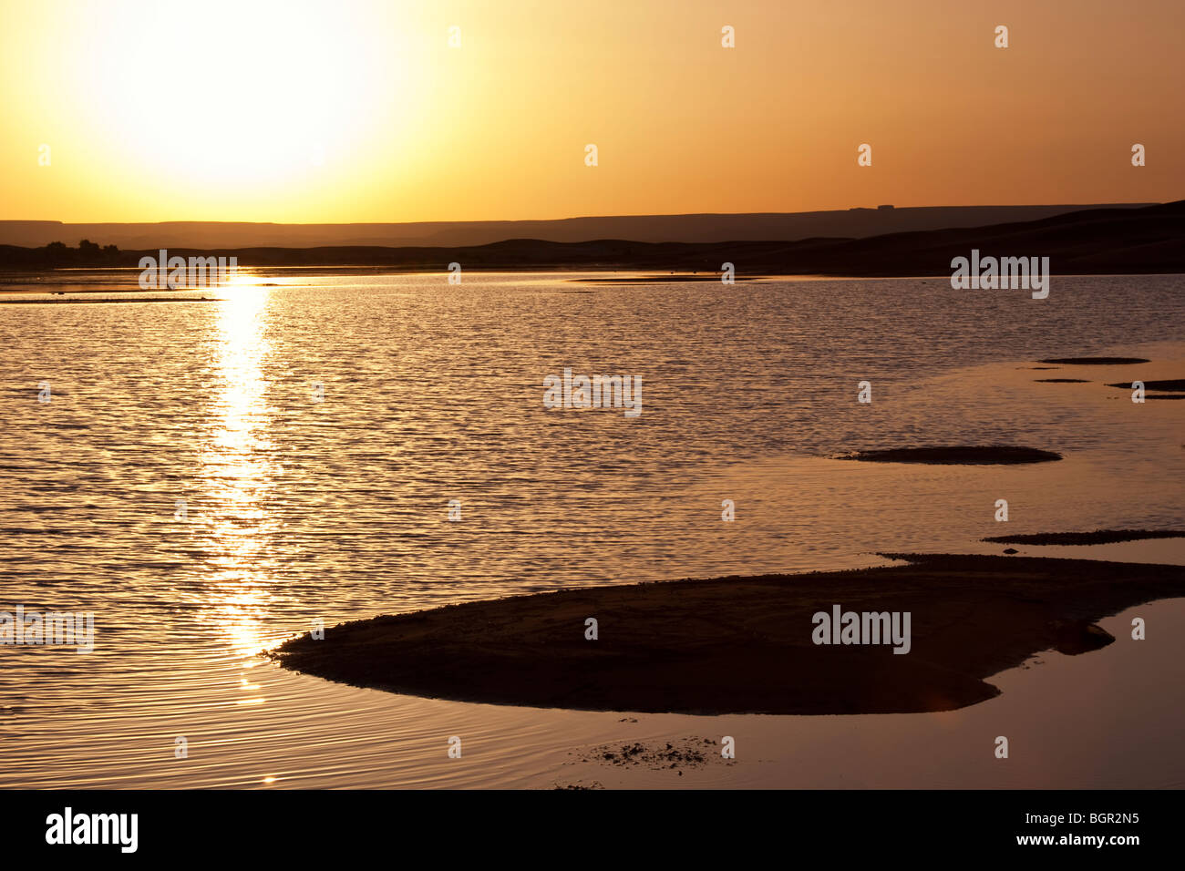 sunrise at desert lake Stock Photo