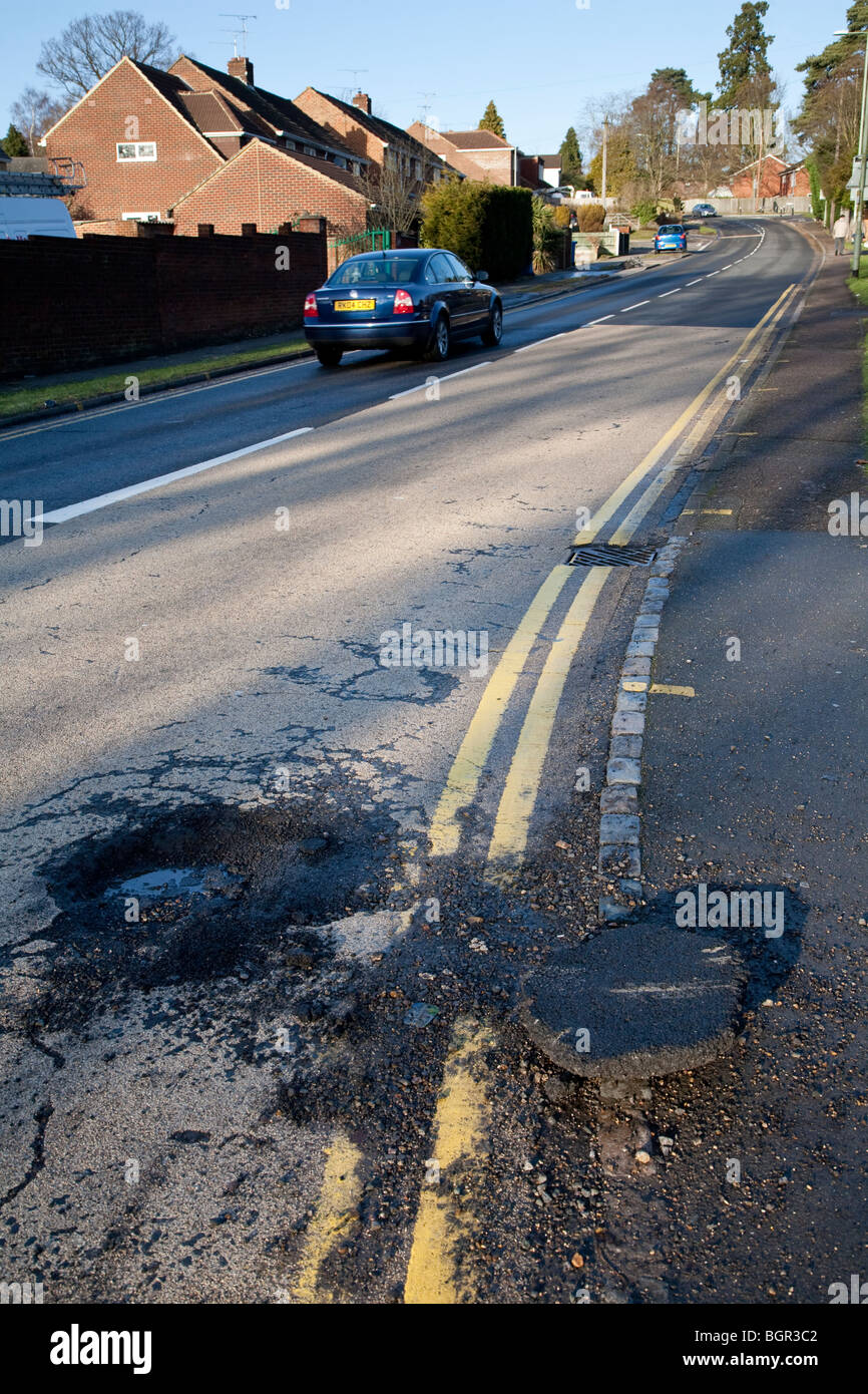 Pot hole in Crowthorne Road, Sandhurst following snow and freezing