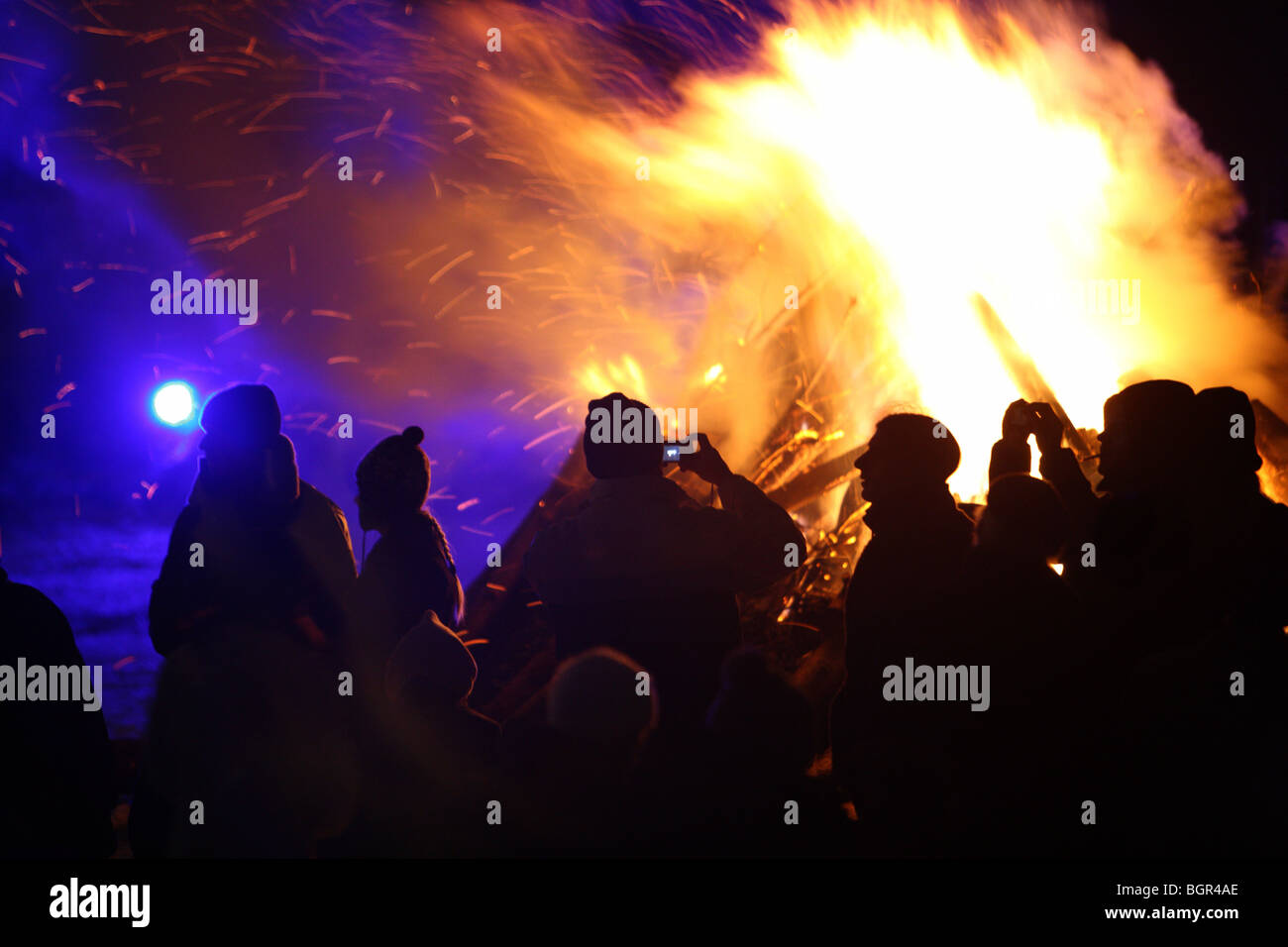 people in front of a big camp fire, Essen, NRW, Germany Stock Photo