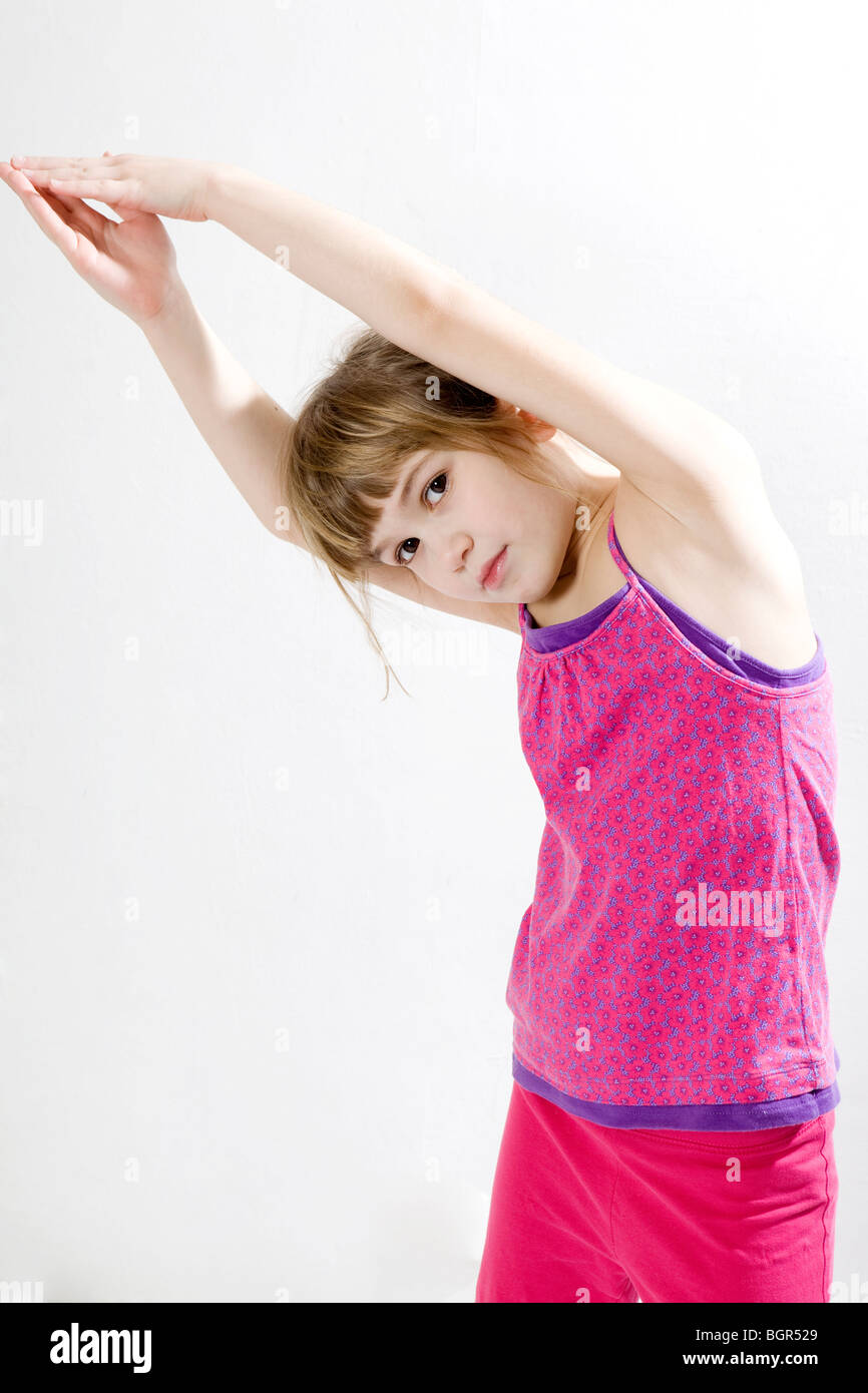 little cute girl doing yoga Stock Photo - Alamy