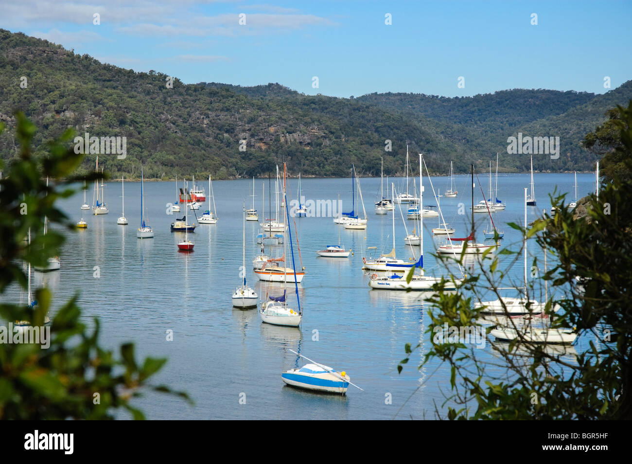 Yachts moored on the Hawkesbury River, Brooklyn, New South Wales, Australia, about an hour north of Sydney. Stock Photo