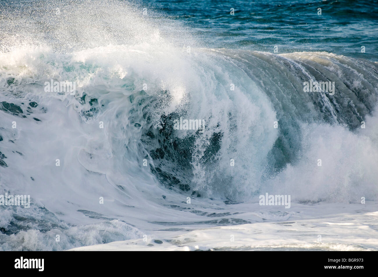wave waves rough sea white horses surf surfing atlantic rollers crash crashing water sea seas spray blue surfing fuerteventura c Stock Photo