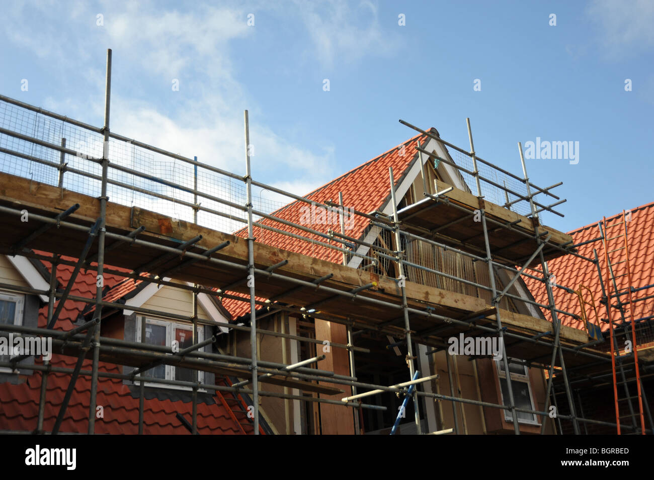 New houses under construction on a building site - UK Stock Photo