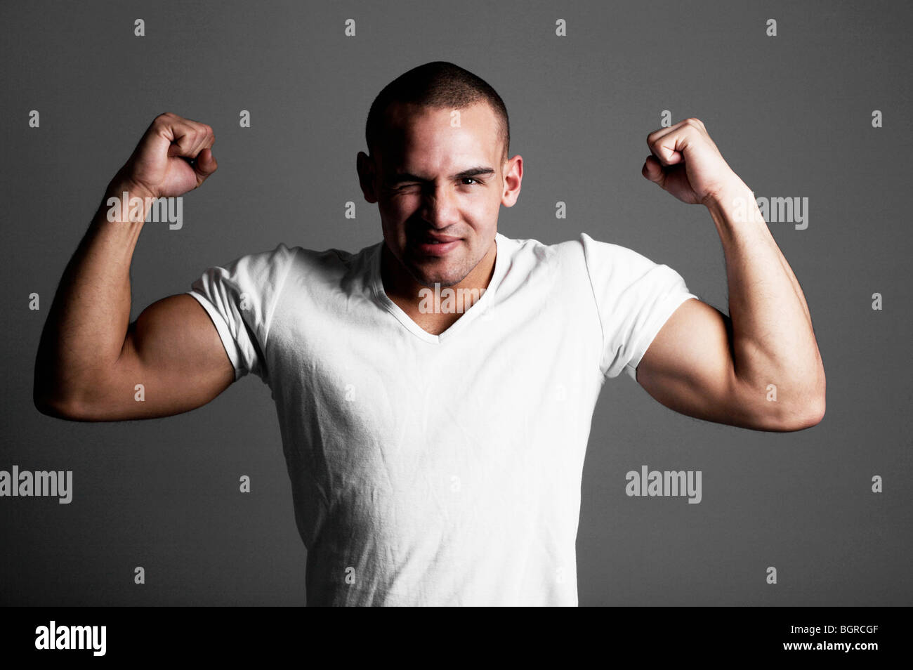 Old man flexing muscles hi-res stock photography and images - Alamy