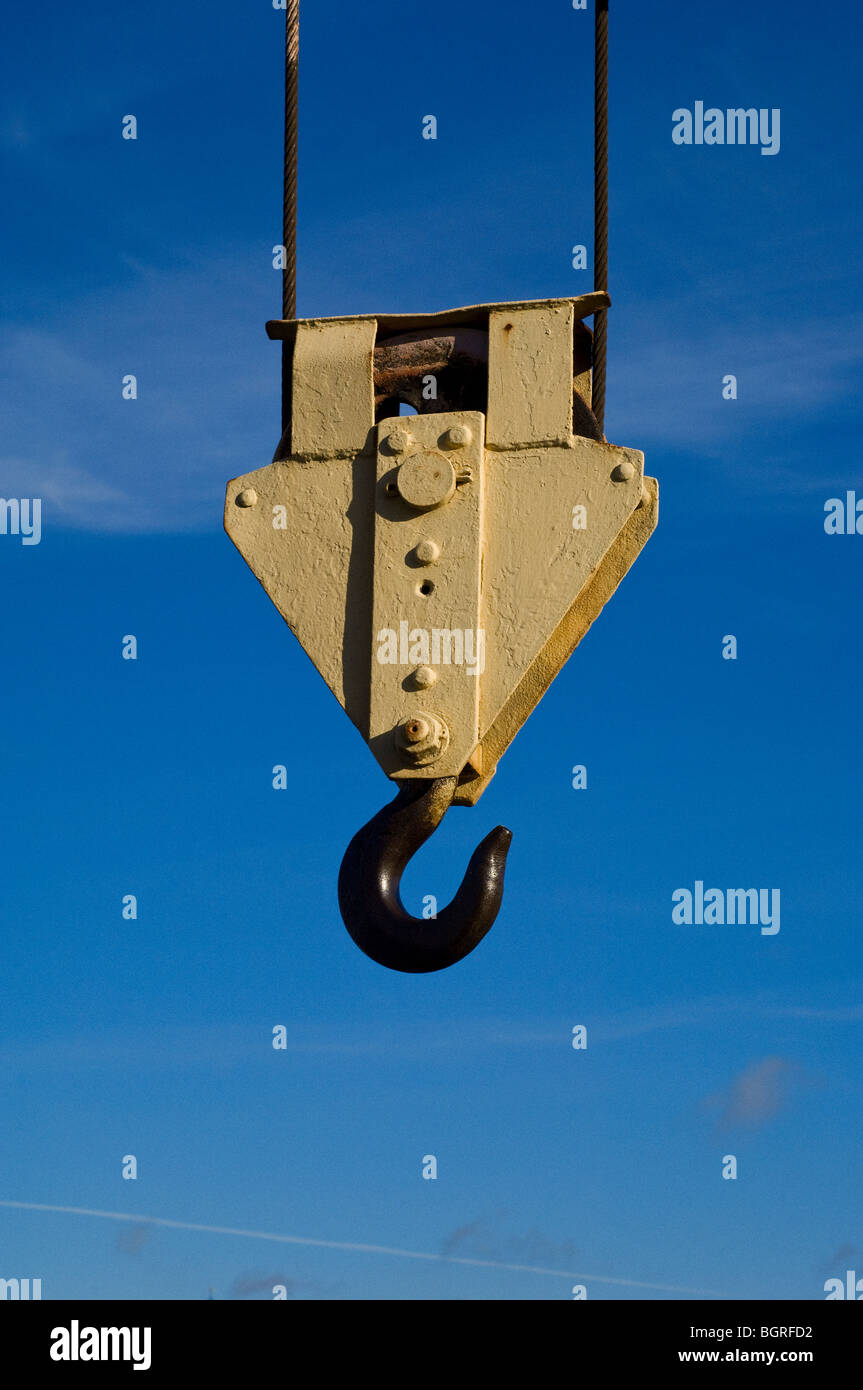 A hook from a lifting crane against a blue sky, Sweden. Stock Photo