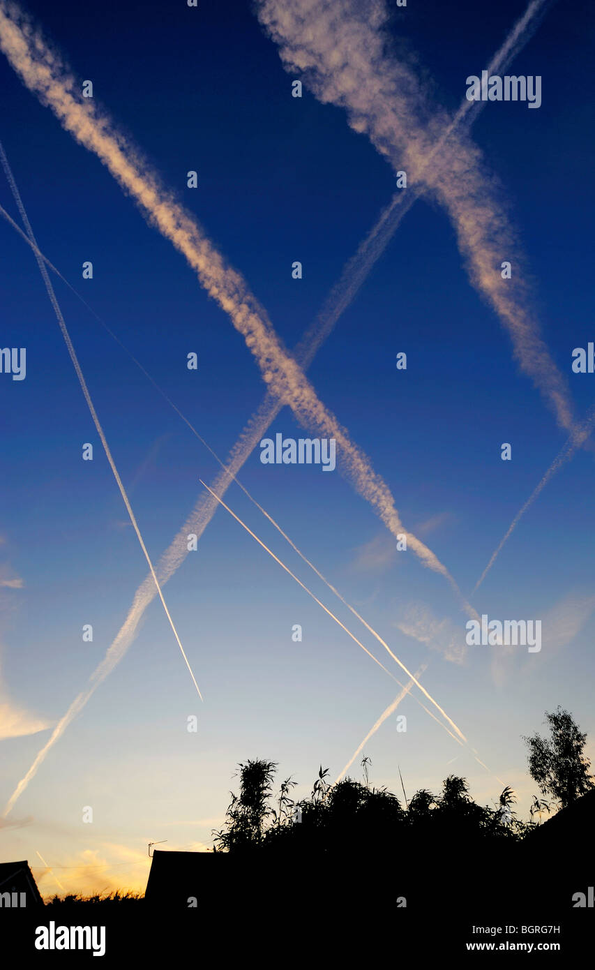 Contrails, vapour trails of chemtrails in the evening sky over Northwest England. Date: 02/06/2009 Stock Photo