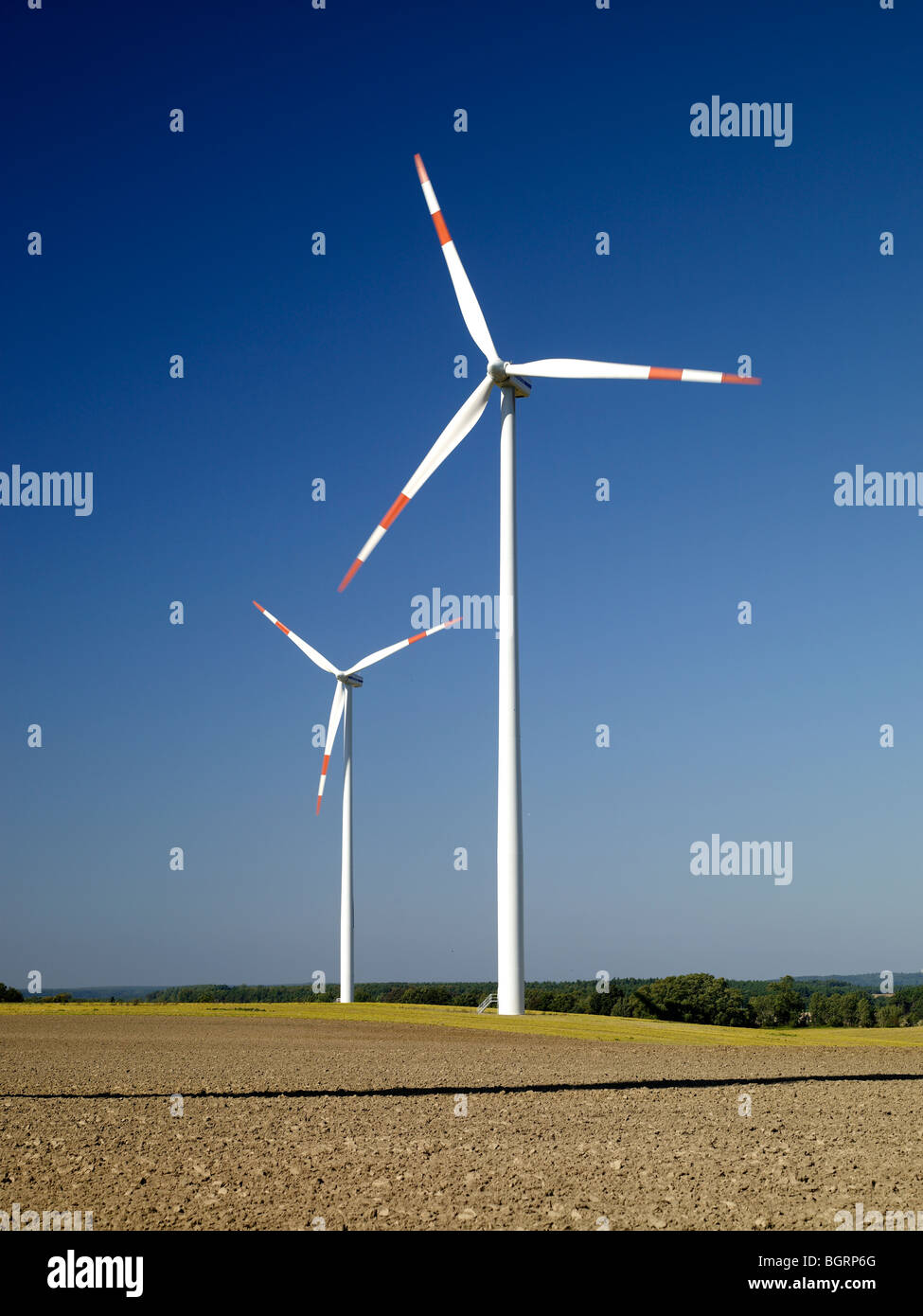 wind turbines and a blue sky Stock Photo - Alamy