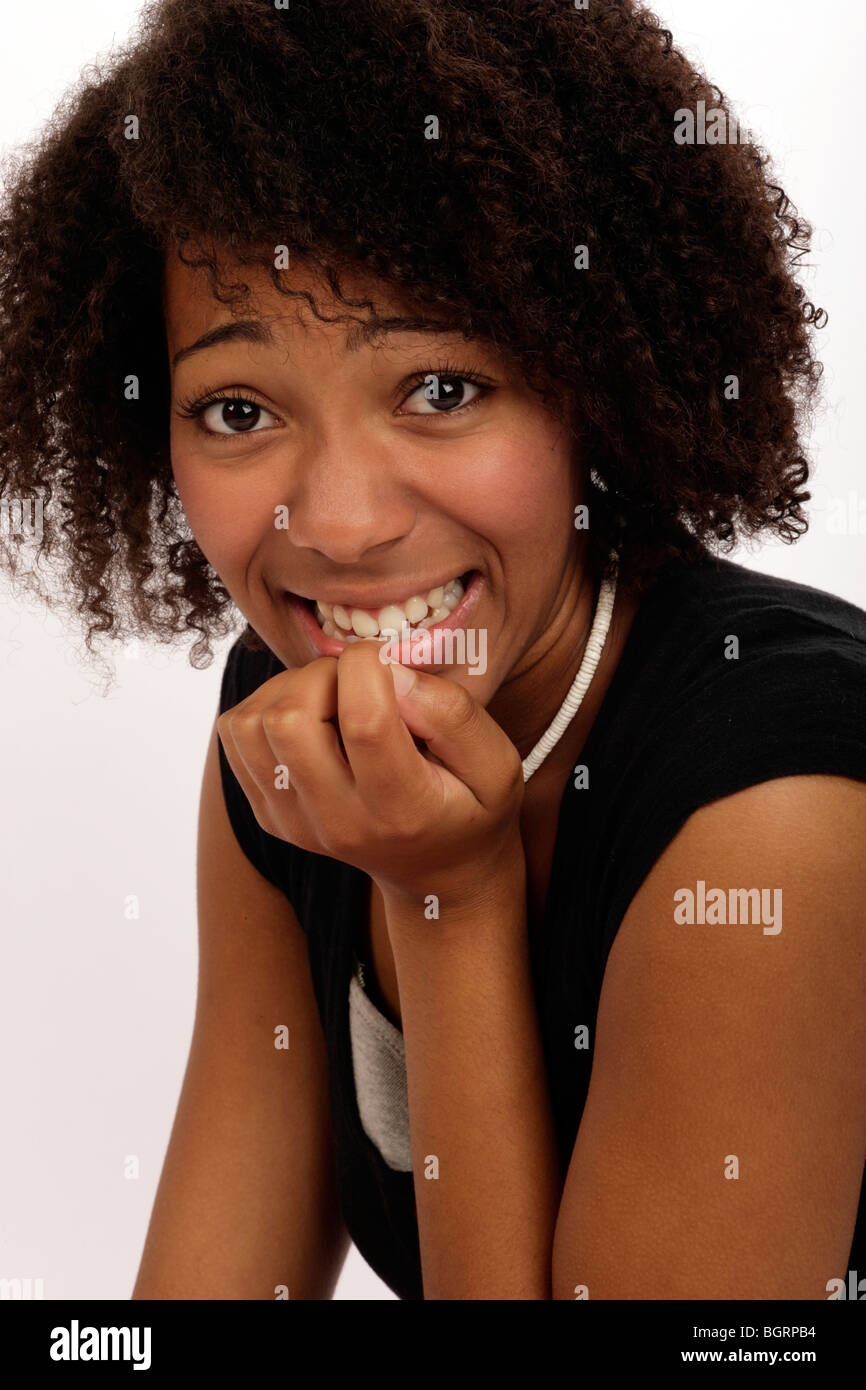 Woman biting her nails Expressions Worried stressed thoughtful nervous concerned anxious Stock Photo