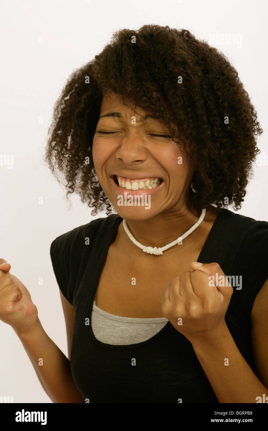 tense young woman with frizzy hair Stock Photo