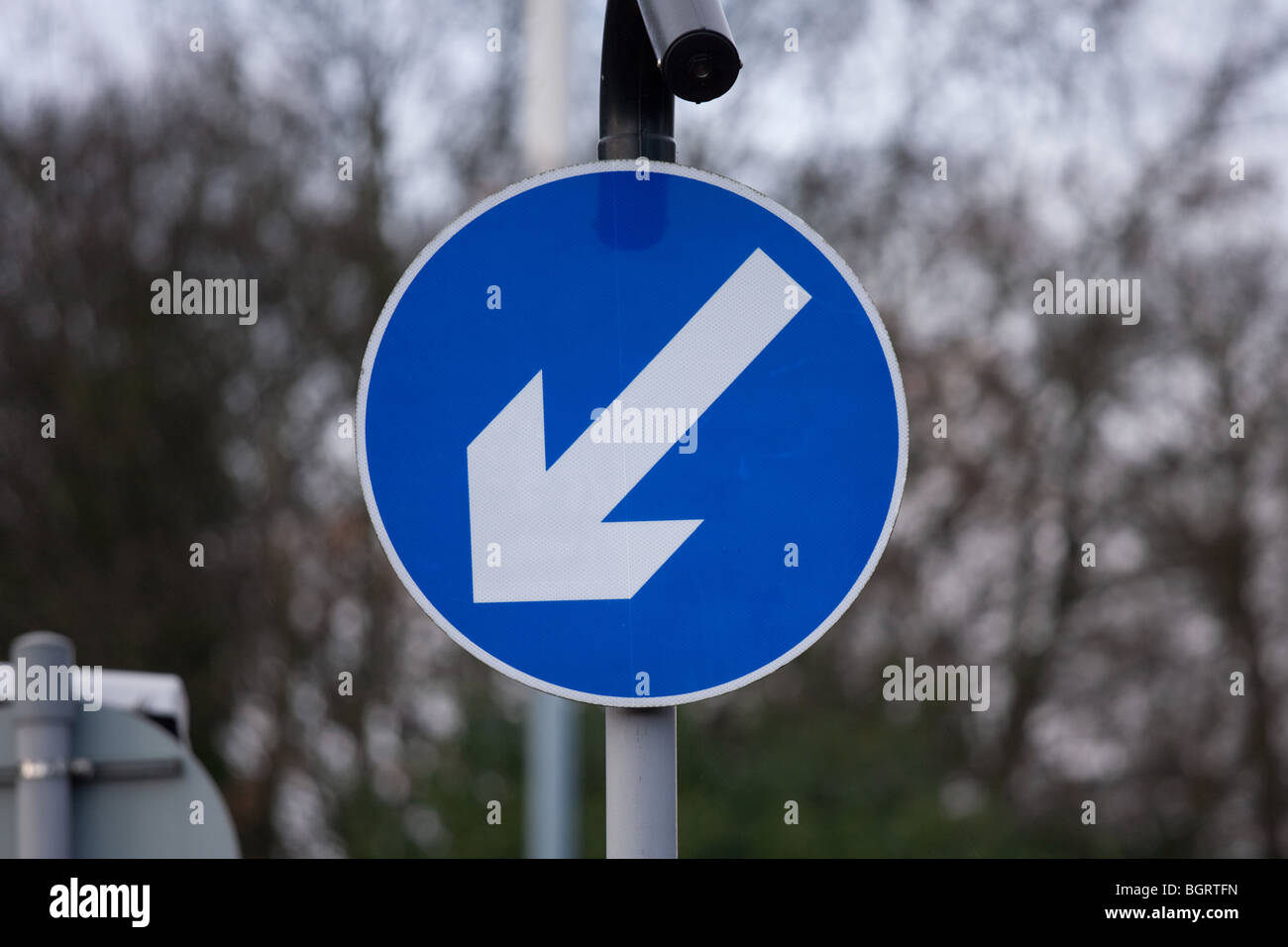 Examples of UK street signs. Keep left Stock Photo Alamy