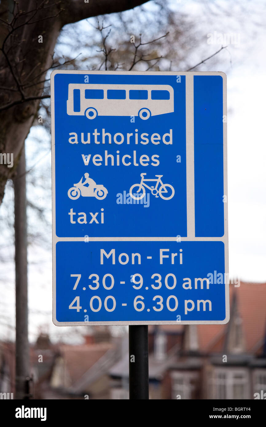Examples of UK street signs. Bus lane restrictions Stock Photo Alamy