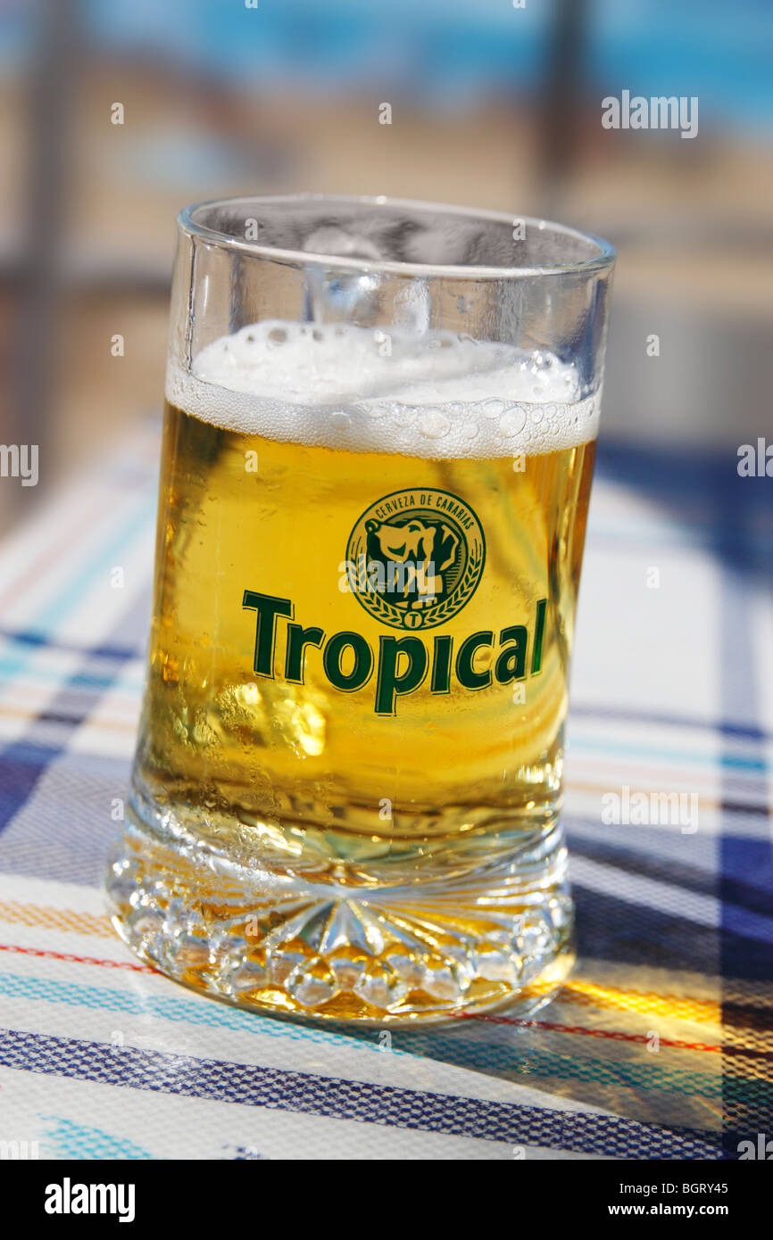 Ice cold glass of "Tropical cerveza, the locally brewed beer on Gran Canaria in the Canary