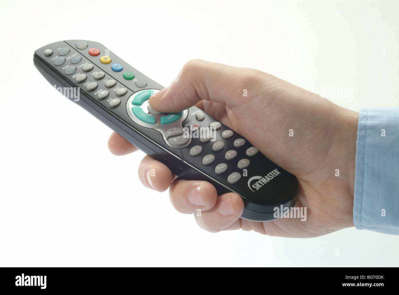 Hand holding a remote control Stock Photo Alamy