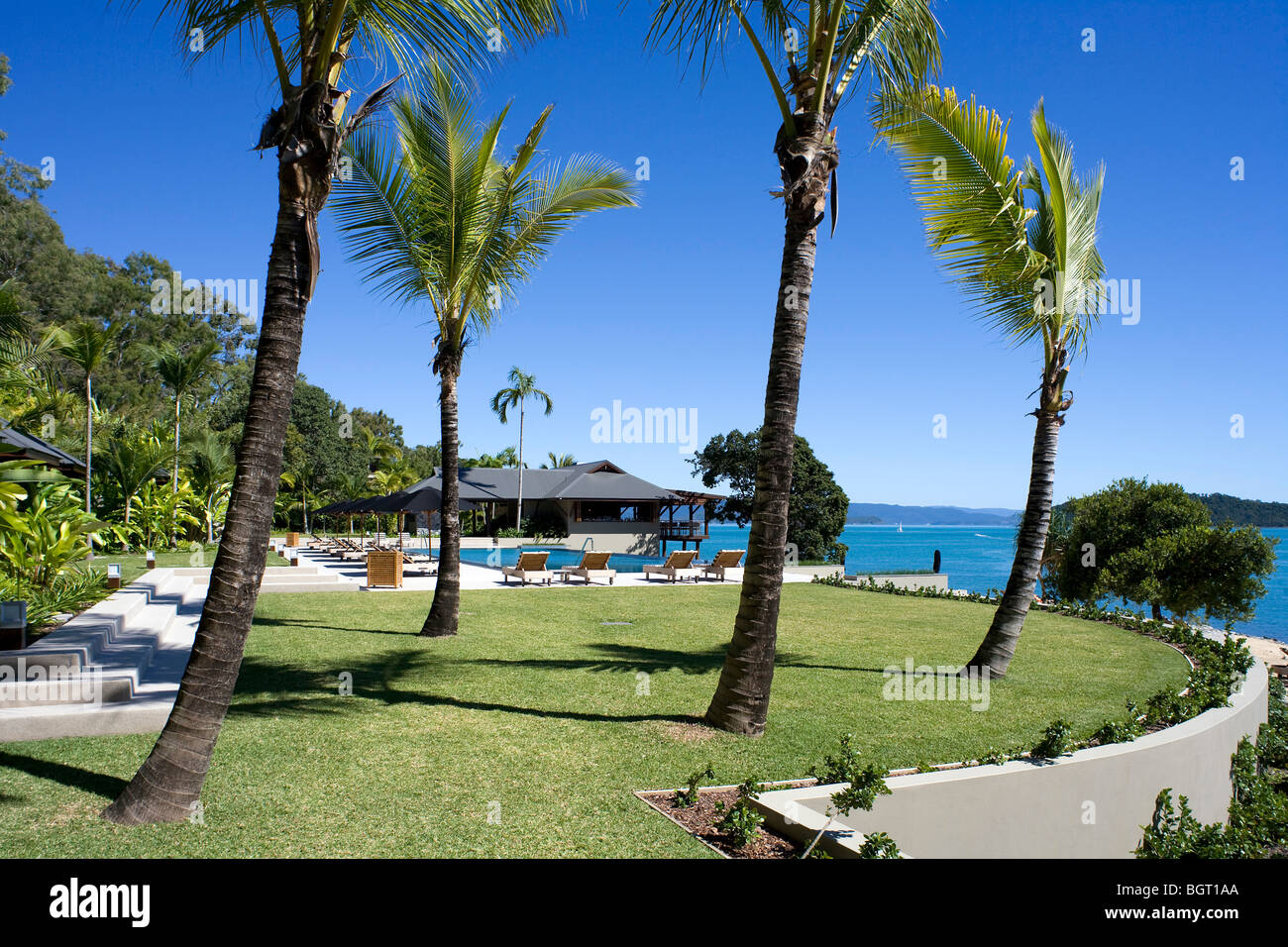 qualia resort. pool and sun bathing Stock Photo Alamy