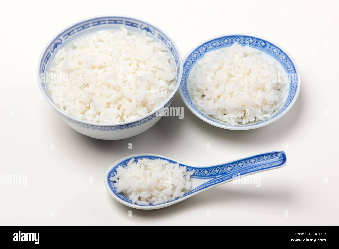 Bowl of white rice isolated on white Stock Photo - Alamy