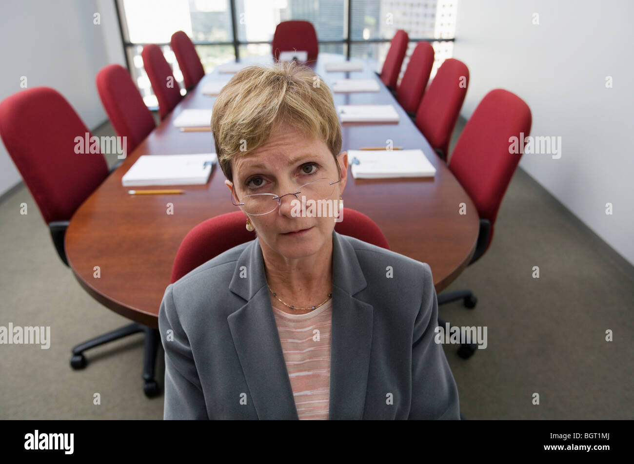 Overwhelmed corporate executive before conference meeting. Stock Photo