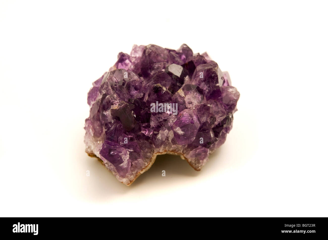 Raw Amethyst on a white background Stock Photo