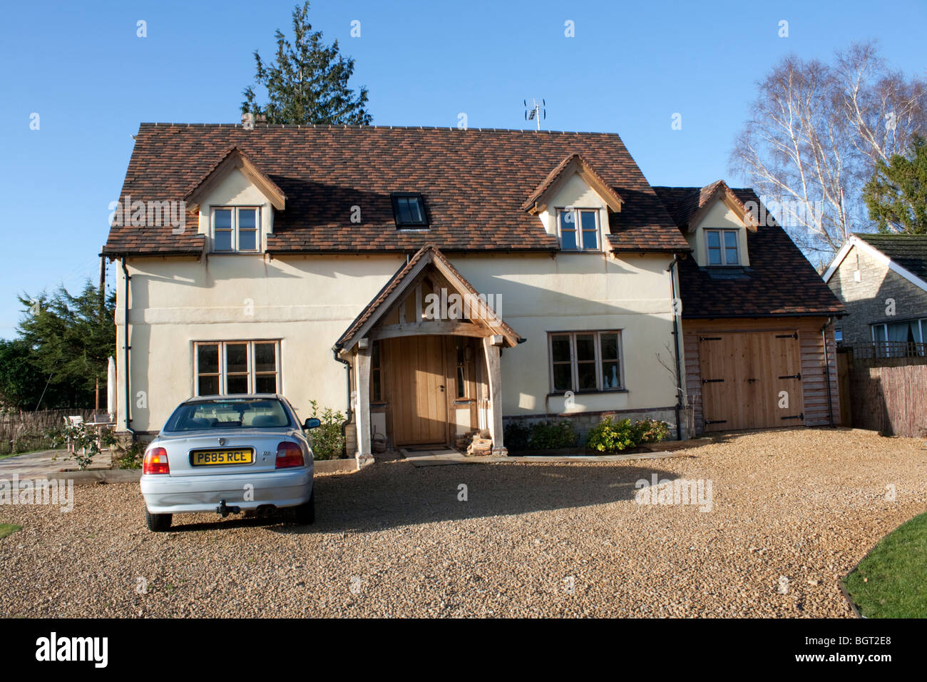 Attractive small country cottage with oak framed porch Beckford Gloucestershire UK Stock Photo